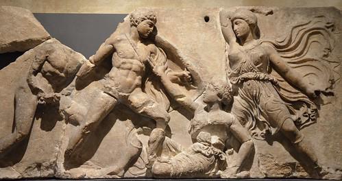 Dramatic scene of an Amazonomachy battle between Greek soldiers and Amazon warriors depicted on ancient Greek pottery
