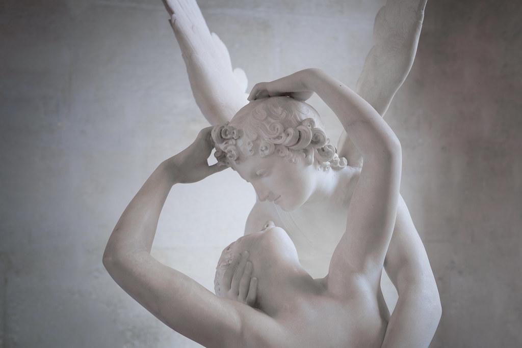 Eros and Psyche in a tender, passionate embrace