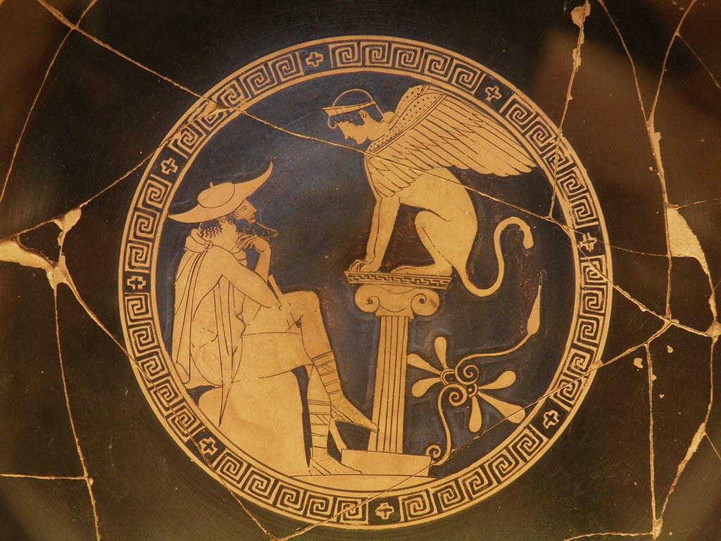 Oedipus confronting the Sphinx, symbolizing his journey towards fulfilling the prophecy
