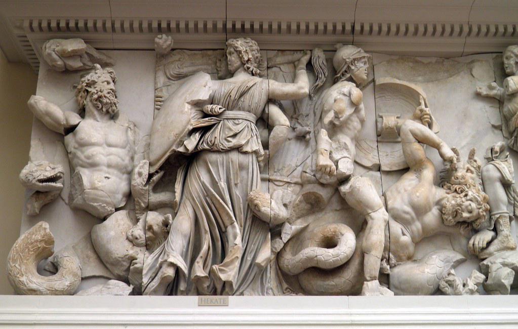 The Olympian gods battling against the Giants, with Heracles playing a crucial role in the intense cosmic conflict